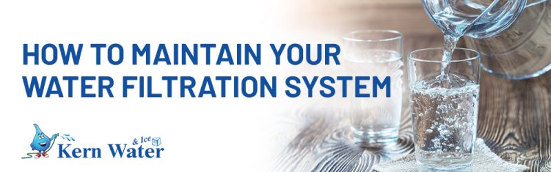 How To Maintain Your Water Filtration System title with a glass pitcher of clear, clean water being poured into a glass cup.
